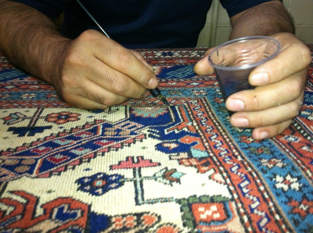 Professional area rug color correction and color run removal service showcasing restored vibrant colors and intricate patterns.