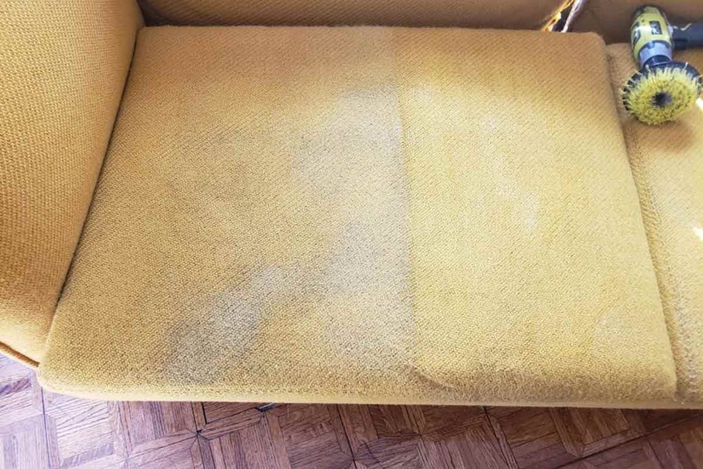 Side-by-side comparison of upholstery cleaning results